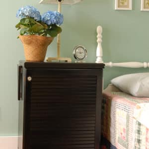 Black Sewnatra Sewing Cabinet (503) from Arrow Sewing Furniture used as nightstand