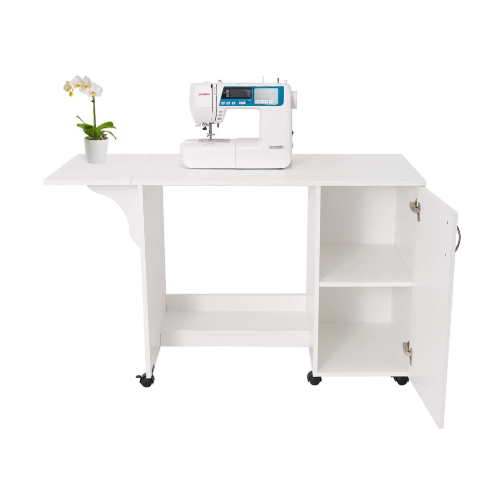 white sewing cabinet with drawers open