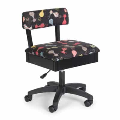 This hydraulic sewing chair offered by Arrow Sewing Furniture offers an adjustable seat, plush cushions, lumbar support and five-star 360° swivel base to make it easy to sew ergonomically.