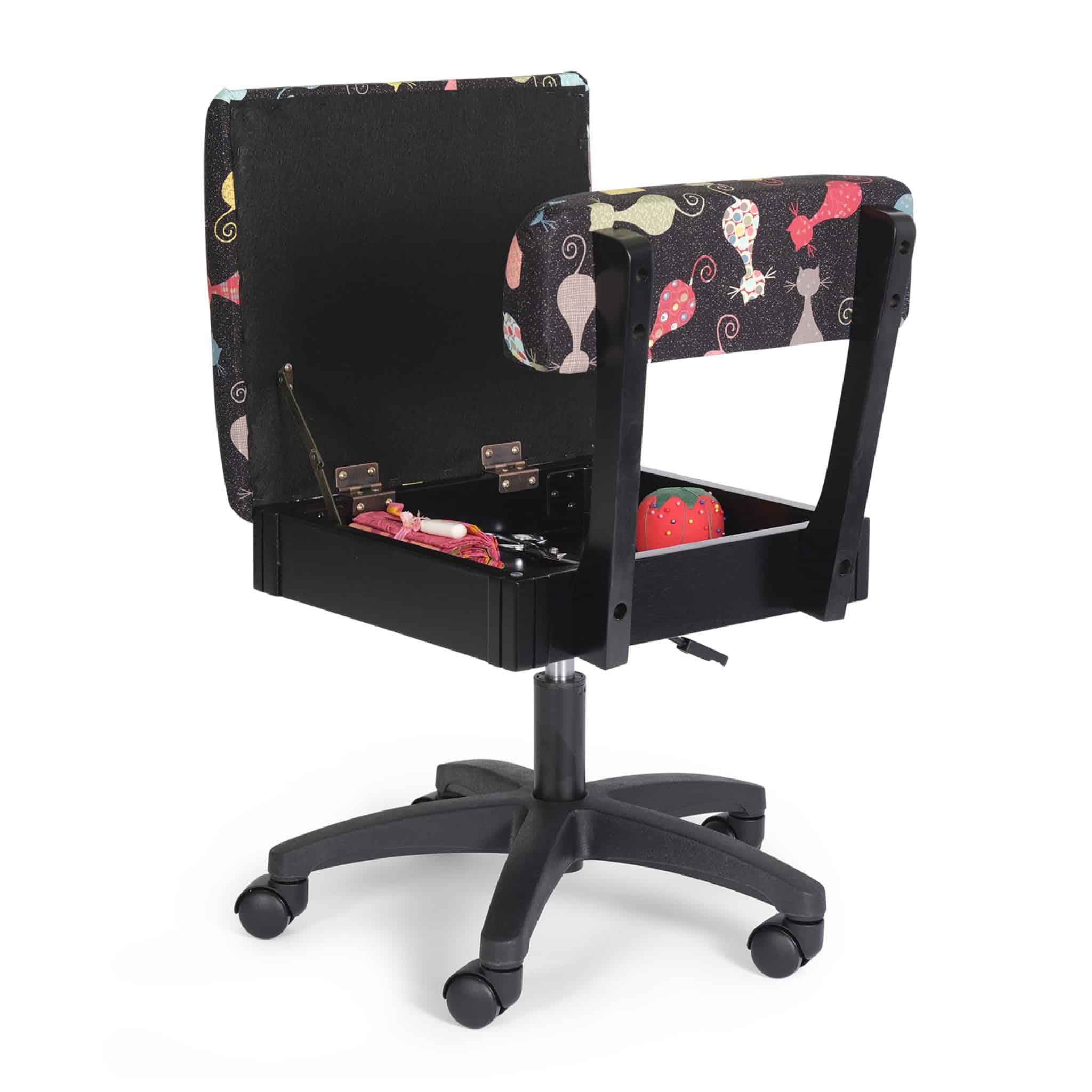 The Cat's Meow Hydraulic Sewing Chair's seat turns into a secret storage compartment. This ergonomic chair is also perfect for stashing notions or an emergency chocolate bar.