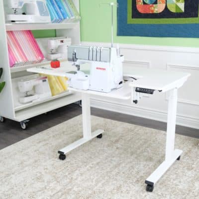 Eleanor Serger & Sewing Table is designed for ultra comfortable sit-or-stand serging, sewing, and cutting projects. By Arrow Sewing Furniture