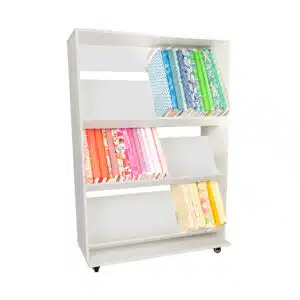 The 3 Shelf Fabric Organizer is Arrow Sewing’s signature fabric organizer featuring 3 slanted shelves that accommodate up to 80 bolts of fabric.