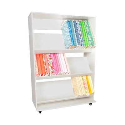 The 3 Shelf Fabric Organizer is Arrow Sewing’s signature fabric organizer featuring 3 slanted shelves that accommodate up to 80 bolts of fabric.